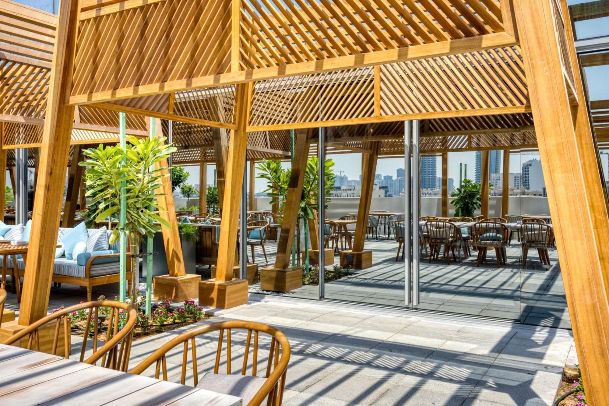 The First Collection Dubai Jumeirah Village Circle, A Tribute Portfolio Hotel Экстерьер фото Rooftop terrace