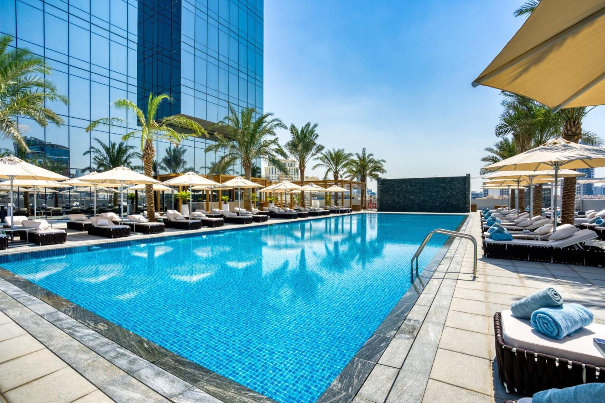 The First Collection Dubai Jumeirah Village Circle, A Tribute Portfolio Hotel Экстерьер фото Swimming pool