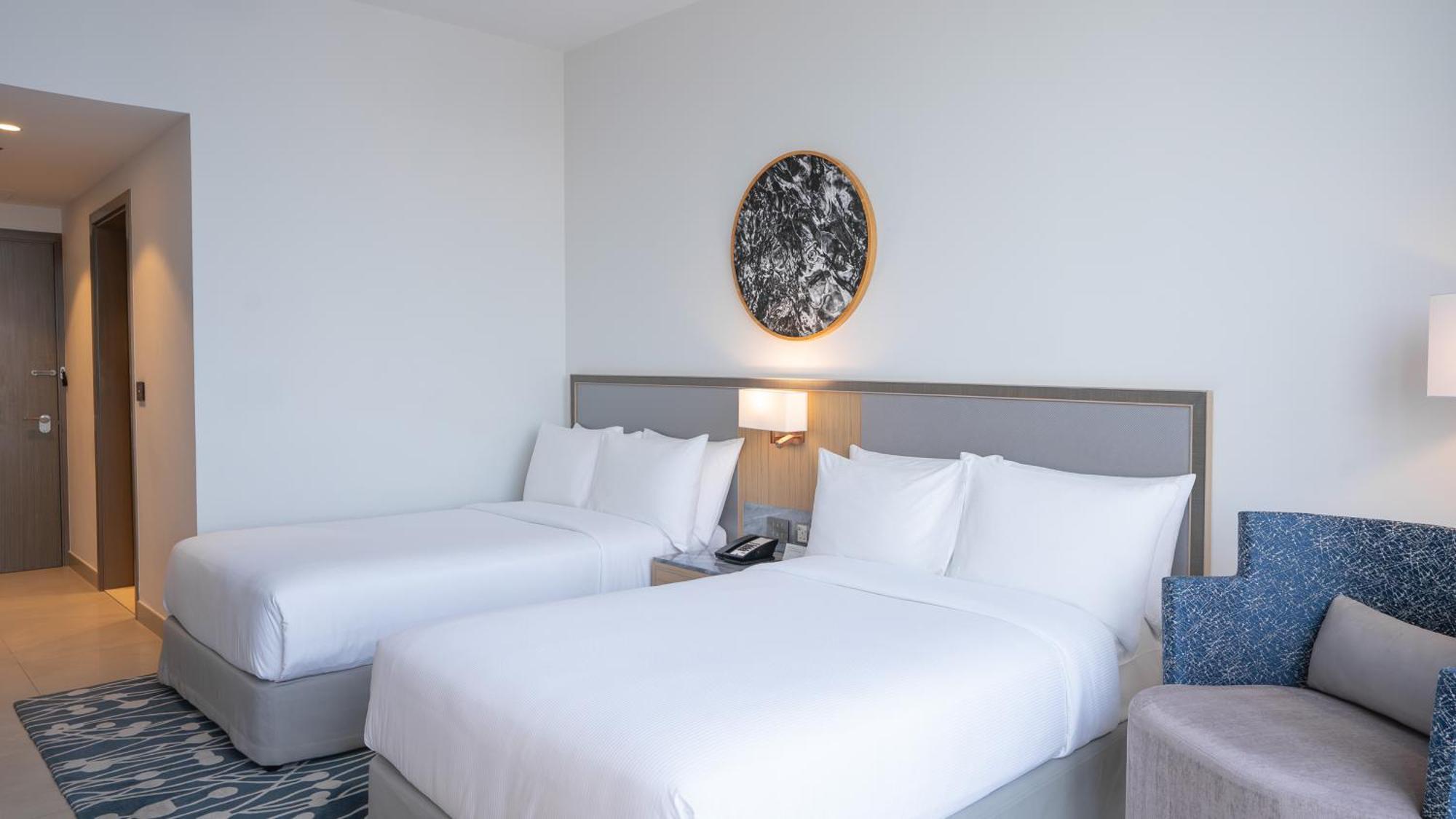 The First Collection Dubai Jumeirah Village Circle, A Tribute Portfolio Hotel Экстерьер фото Room with two beds