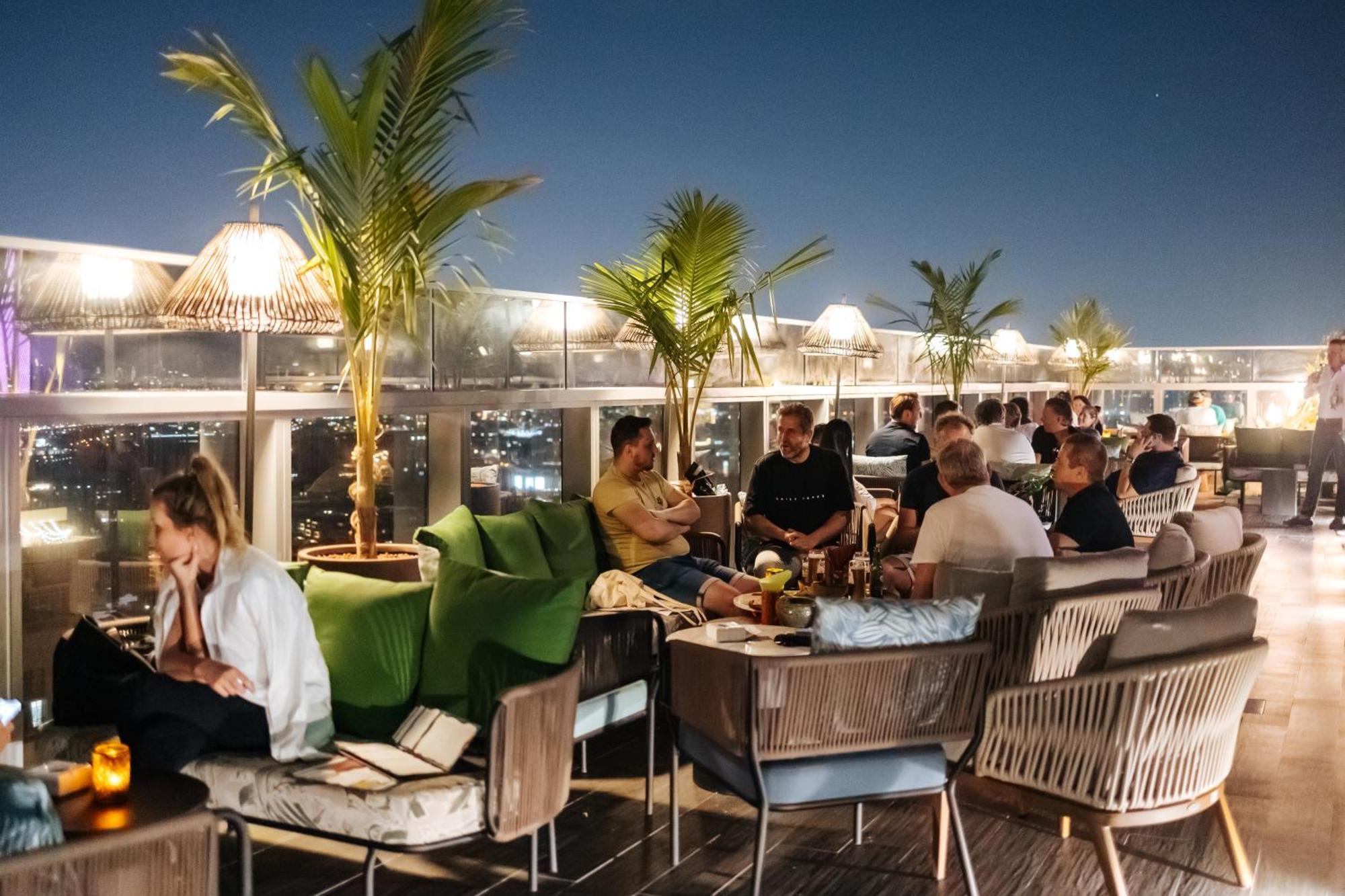 The First Collection Dubai Jumeirah Village Circle, A Tribute Portfolio Hotel Экстерьер фото Rooftop bar at the hotel