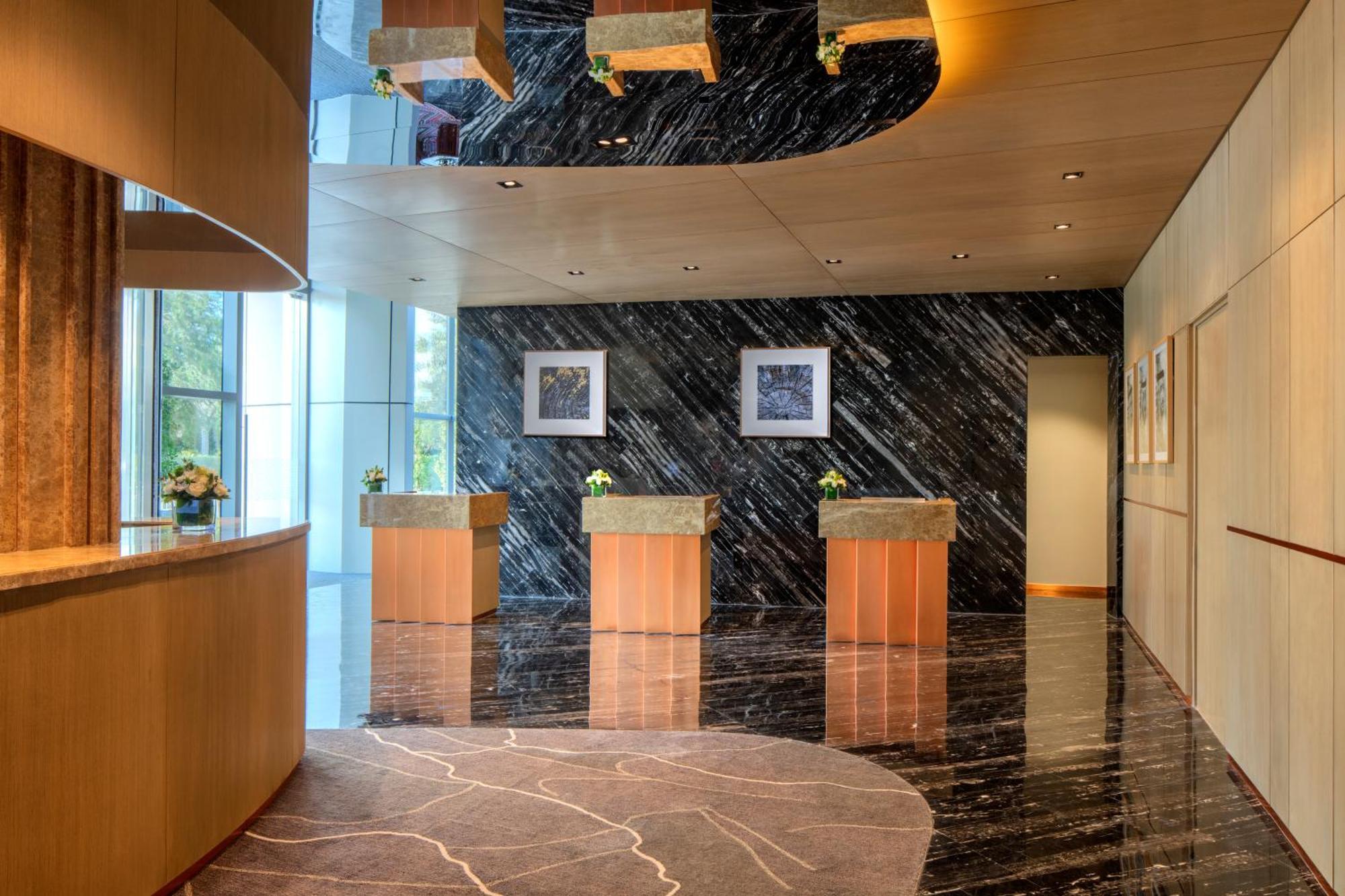 The First Collection Dubai Jumeirah Village Circle, A Tribute Portfolio Hotel Экстерьер фото Reception desk