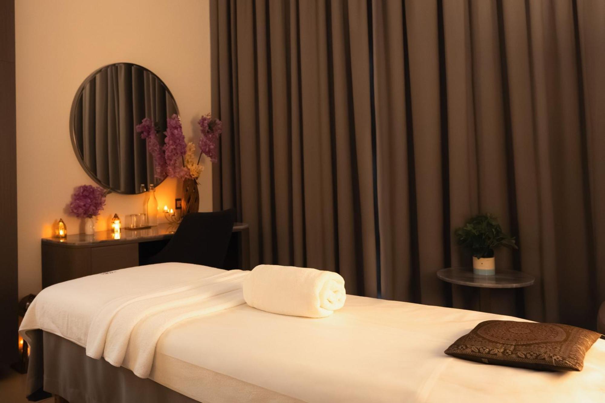 The First Collection Dubai Jumeirah Village Circle, A Tribute Portfolio Hotel Экстерьер фото A massage table in a spa